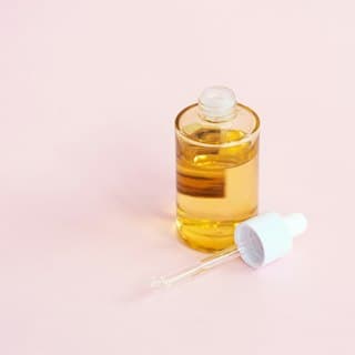 Customer's photo of a serum bottle with a dropper